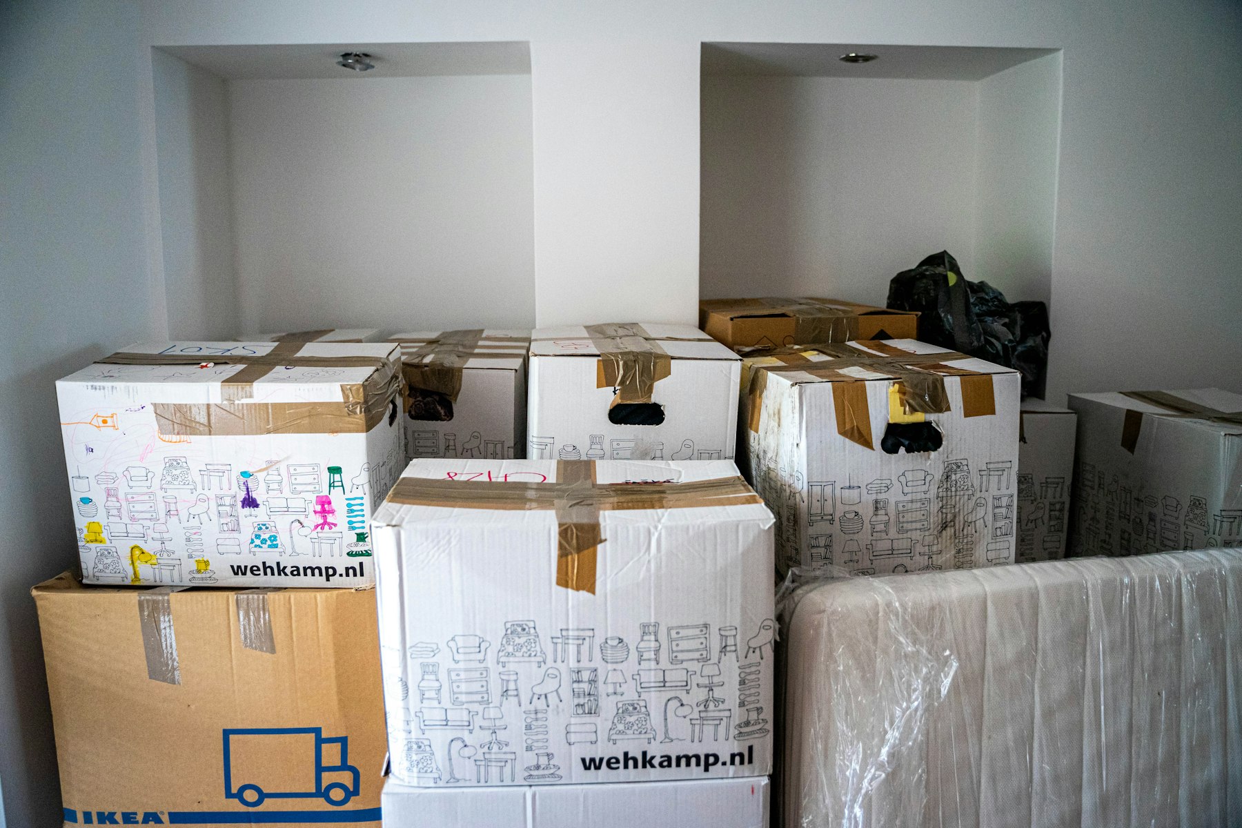 Packed boxes stacked on a table ready to ship