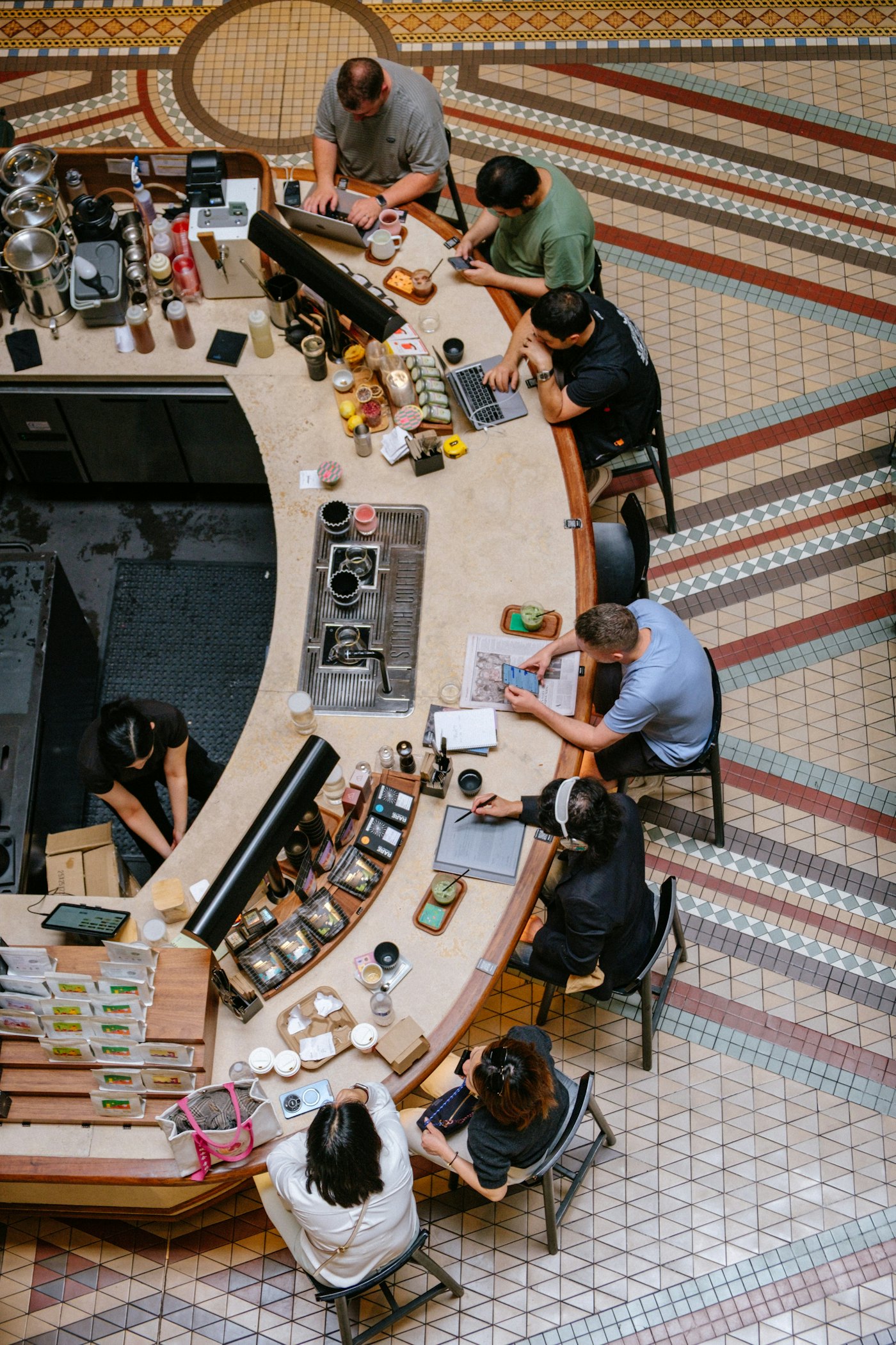Small business owners working behind their counter