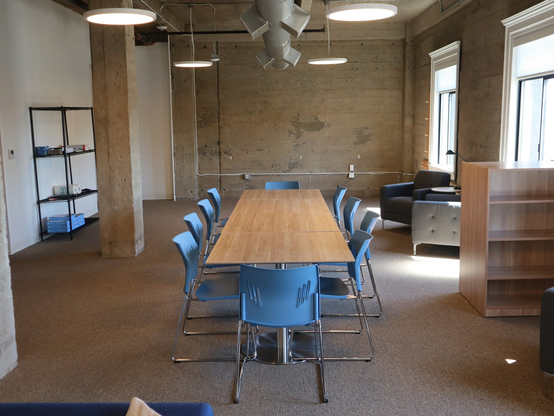People seated around a meeting table