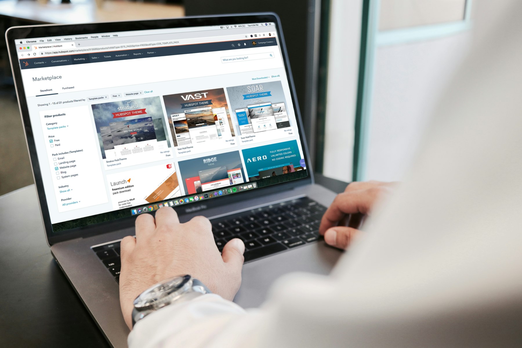 Owner checking a new small business website on a laptop